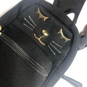 Betsey Johnson crossbody backpack